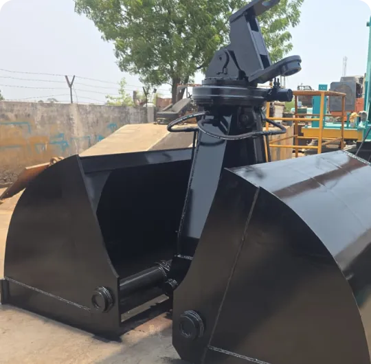 Clam shell bucket for material handling manufactured by Surbhi Earthmover